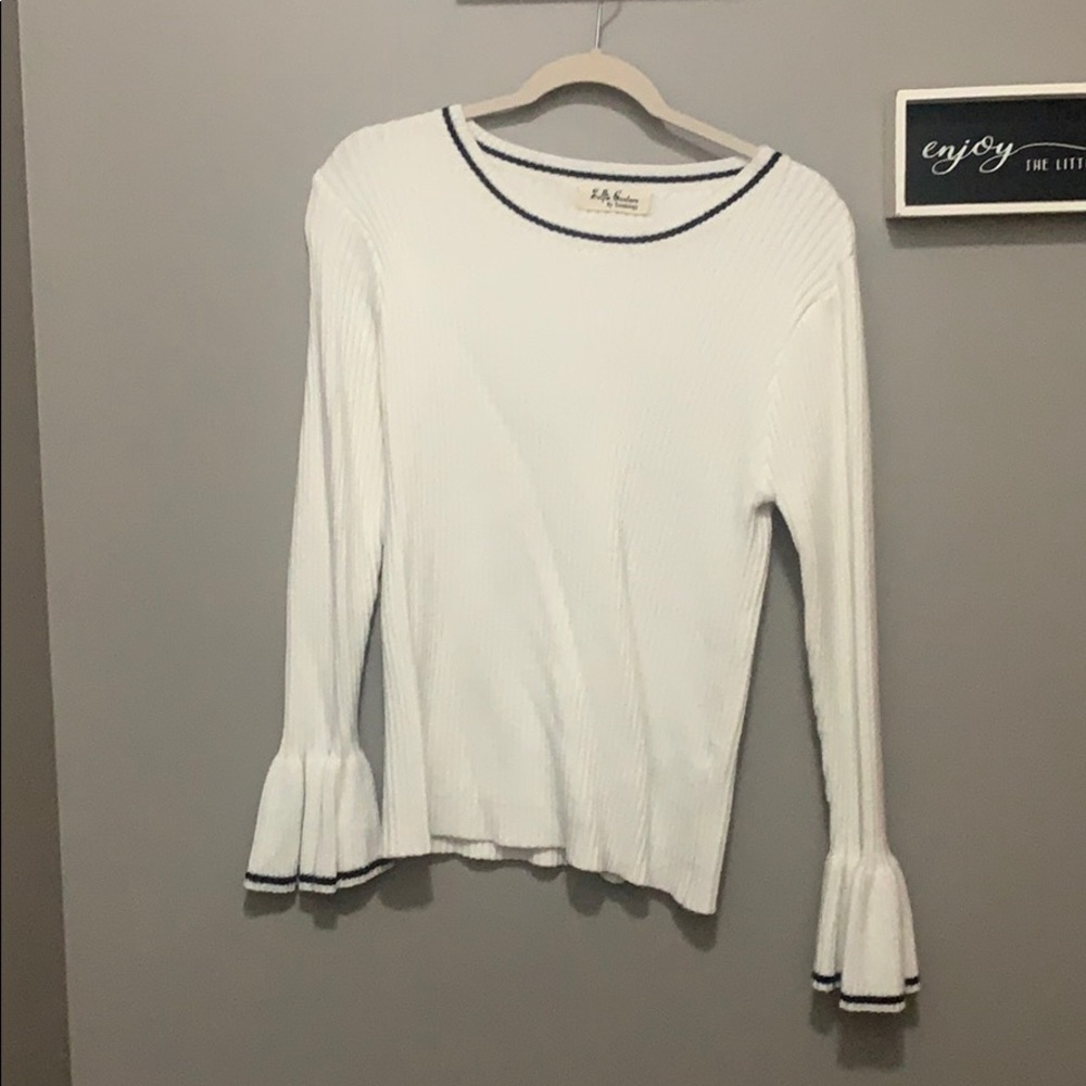 White sweater with black stripe on bell sleeves